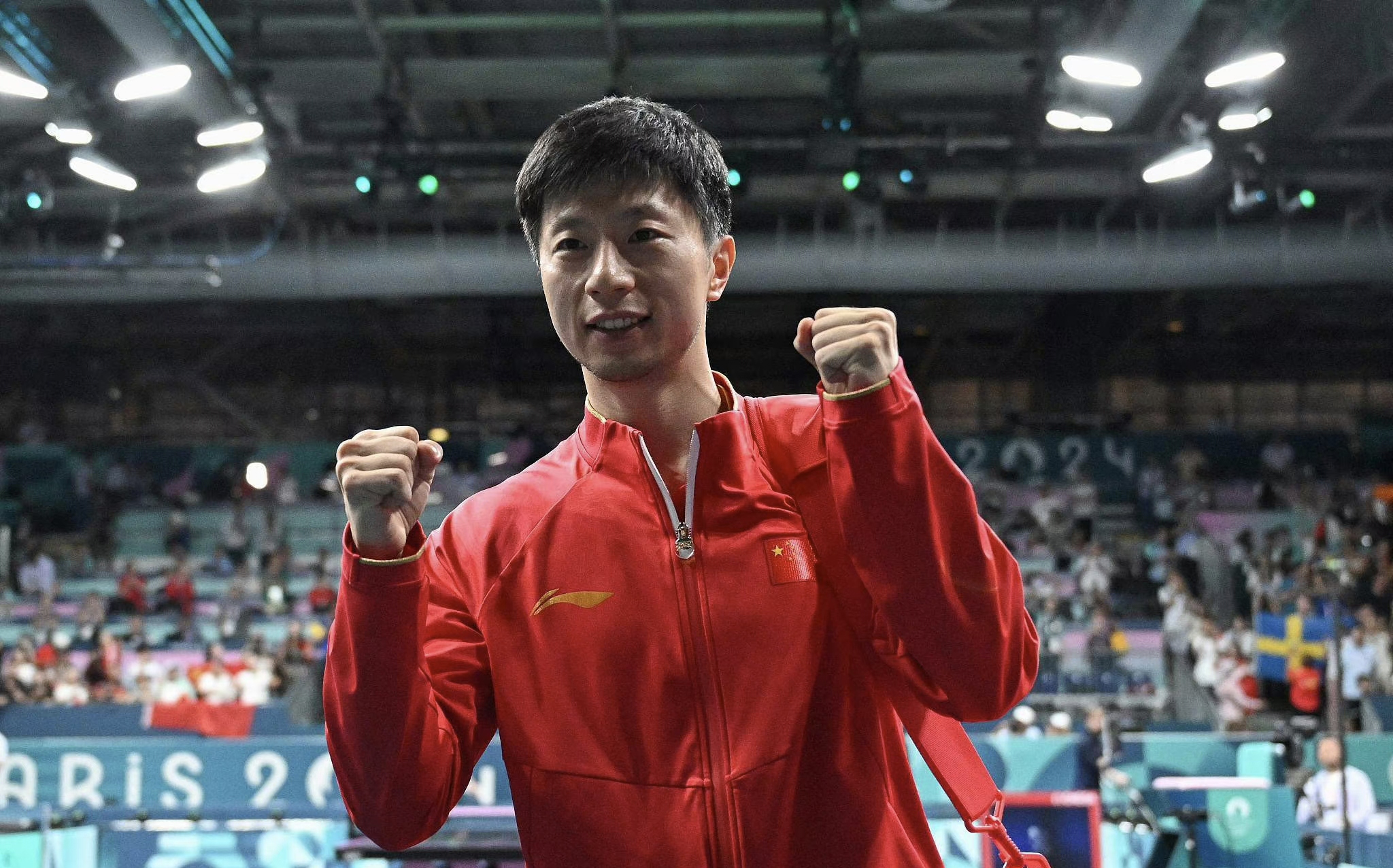 关于中国乒乓球队险胜奥地利乒乓球队，马龙完成帽子戏法的信息